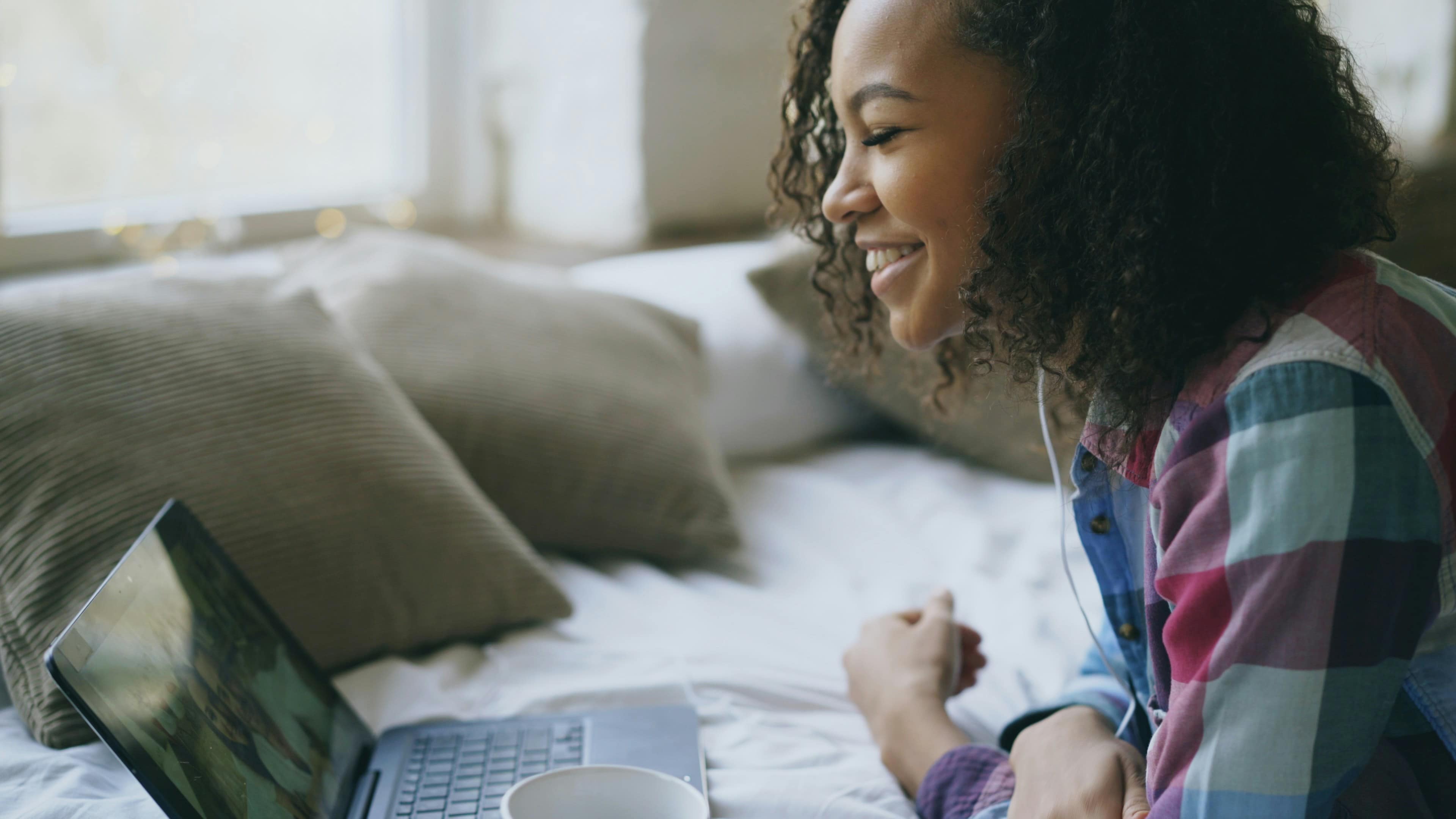 Person on a video therapy session at a tidy home workspace, representing the effectiveness of online therapy