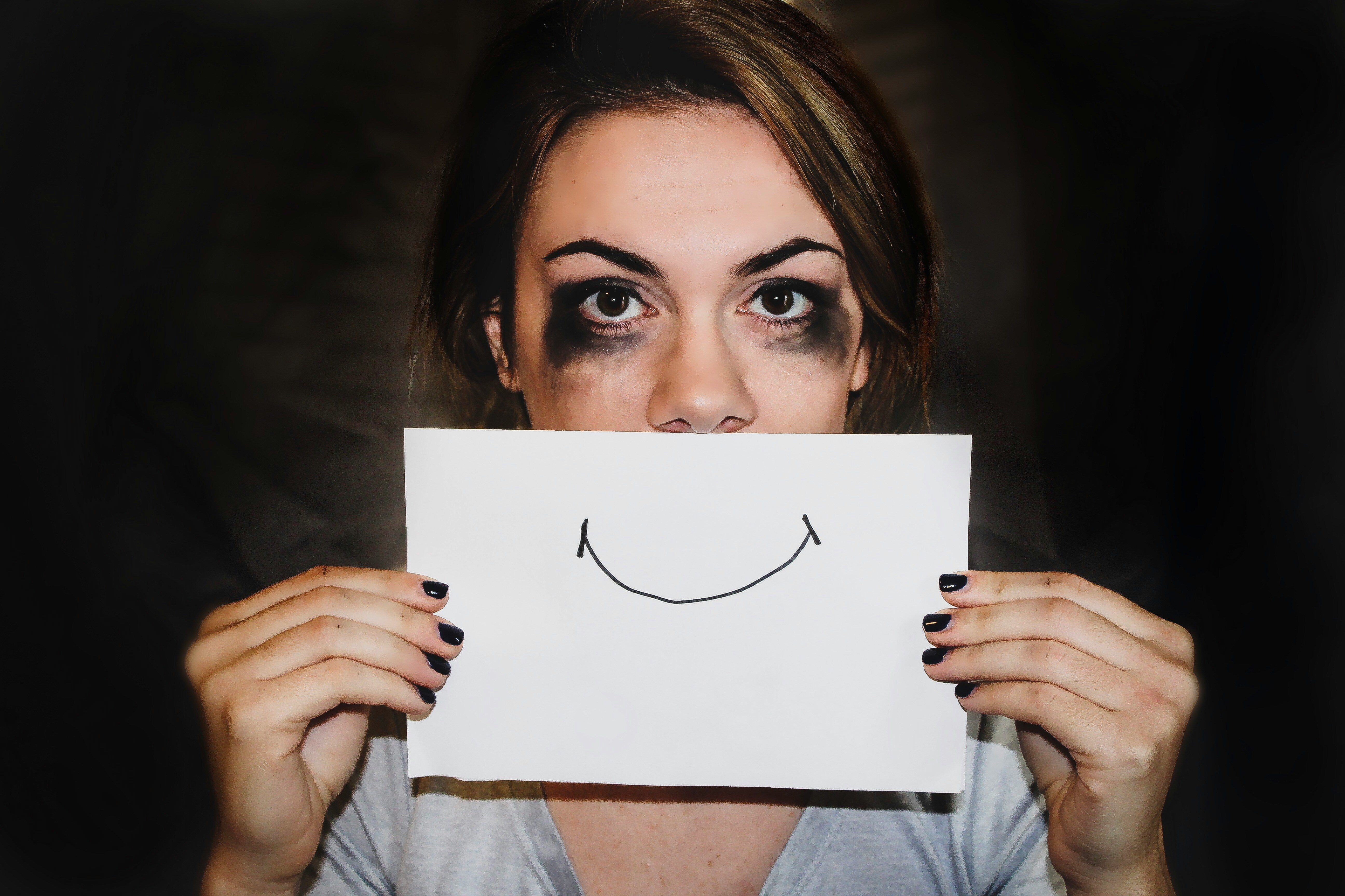 Person appearing composed and put-together on the outside while struggling with high-functioning anxiety inside